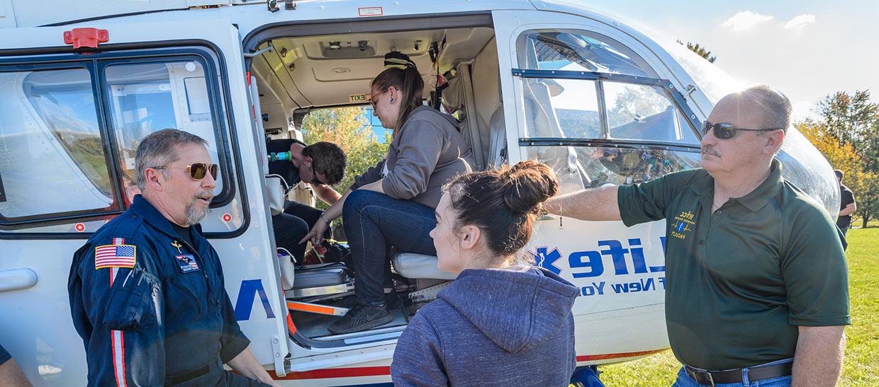 Students with a medical helicopter